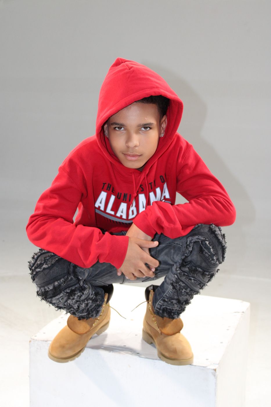 Cody in his signature red hoodie